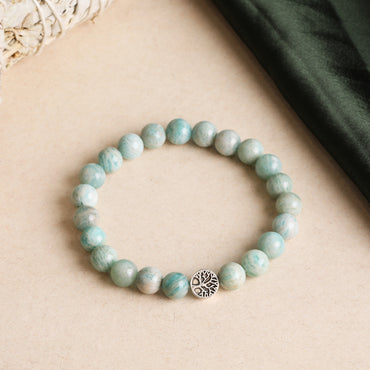Amazonite Crystal Bracelet balances the emotional body and calms the storm within, promoting harmony, aura protection, clarity, open communication, inner peace, and energetic alignment with Star Codes.