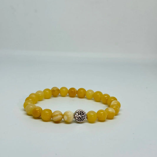 Yellow Calcite bracelet for personal empowerment, solar plexus chakra balance, confidence, mental clarity, stamina, vitality, digestion support, and inner strength with Star Codes.